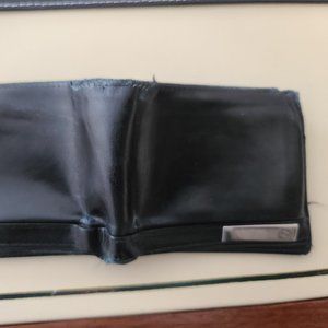 Black used Gucci wallet used by CEO CompUSA